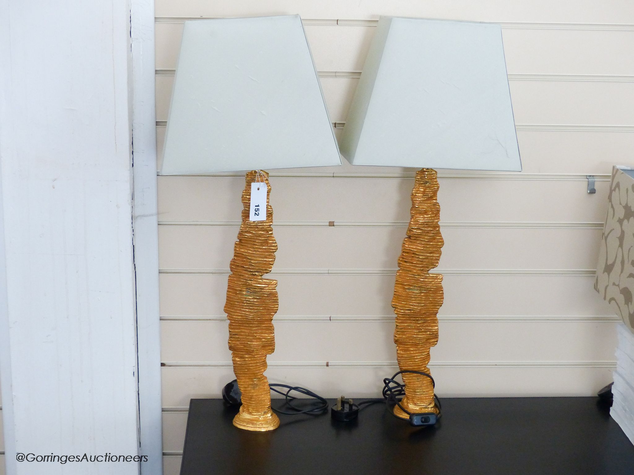 A pair of Galerneau, Paris gilt bronze sculptural lamps, 51.5 cm high to fitting, eau de nil silk shades